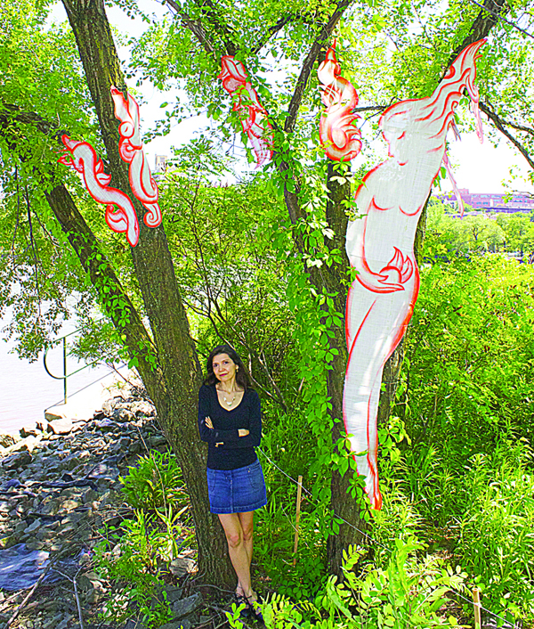 Artist Andrea Arroyo with Lillith and Her Sisters.